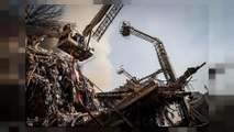 Tehran building collapse: search for dozens of missing firefighters