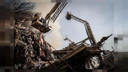 Tehran building collapse: search for dozens of missing firefighters