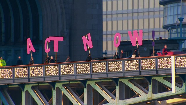 Trump protest banners unfurled in London