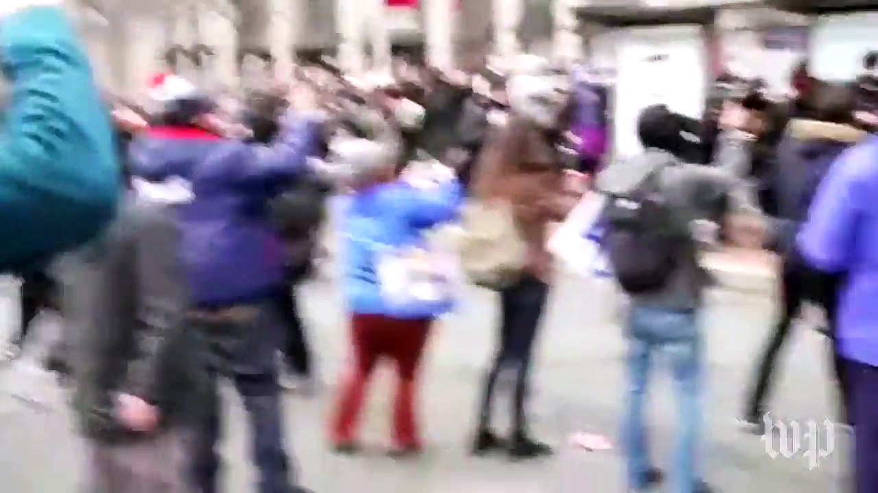 Protesters set limo on fire outside The Washington Post