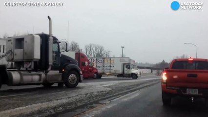 Truck slips and slides on icy road, causing crash-A4Fq5DFT_Ww