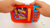 Microwave Candy Surprise Toys!! Learn Colors with PEZ Candy Dispensers