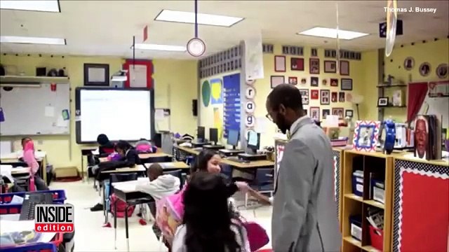 Teacher creates secret handshakes with all of his students