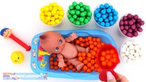 Learn Colors & Counting Baby Doll Bath Time Playing with Pez and Candy Gumballs RainbowLearning