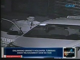 Saksi: Taxi driver na kasabwat daw ng mga holdaper sa Pasig, arestado