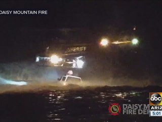 Woman rescued from floodwaters in New River