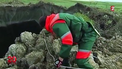 Réchauffement climatique - cratères en Sibérie-PmpswXvqdw8
