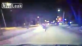 LiveLeak - Dashcam Video shows Man Launching Himself Onto Police Cruiser