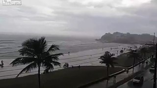 LiveLeak - Exact Moment when Tourist is hit by lightning at a beach in Brazil