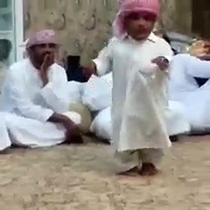 A small Arabic Man Dancing