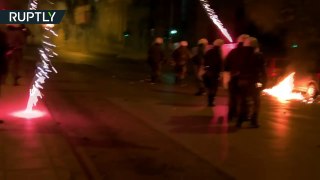 Molotov cocktails, firecrackers hurled at police at march over teen’s death in Athens-cbKqk8ZXTKQ