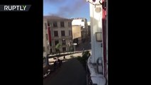 RAW - Shots fired as refugees escape burning deportation center in Istanbul-QTnJj-7_ecs