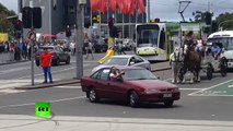 Rogue red car ‘driving erratically’ caught on cam before ramming into crowd in Australia-Hm5pa7RVDms