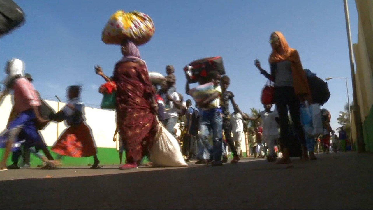 Gambians return home as political crisis ends