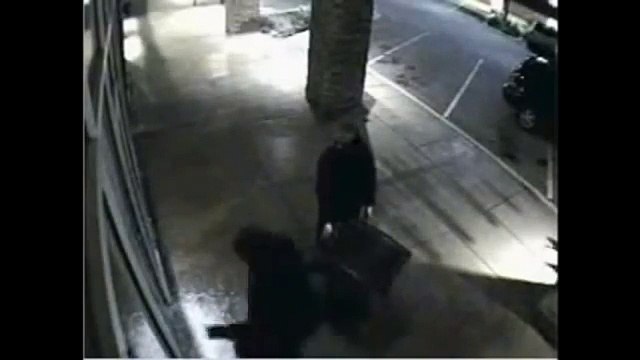 Thieves Attempt to Break Through Window with Window Film on Security Camera
