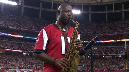 Mike Phillips plays National Anthem on saxophone before NFC Championship game