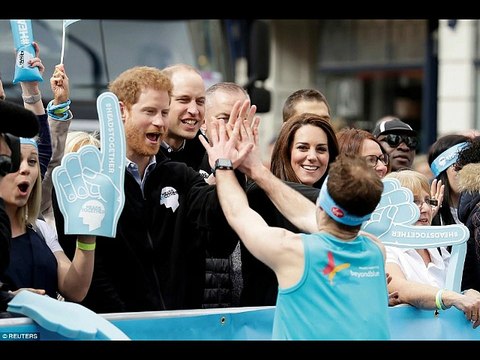 London Marathon runner sprays water at William and Kate