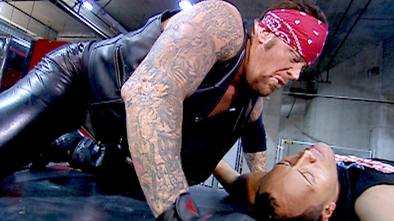 The Undertaker Tombstones The Rock onto a limo- SmackDown, Feb. 7, 2002