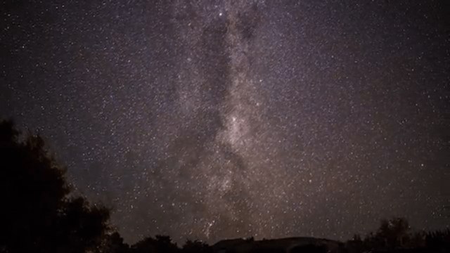 Astrophotographer Captures Shooting Stars Streaking Pass Spinning Galaxy in Timelapse