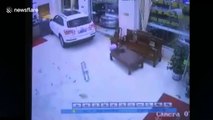 Driver tries to park car, crashes into hotel