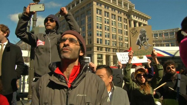 Protesters call for Jeff Sessions to resign for 'lying under oath' about contacting Russia