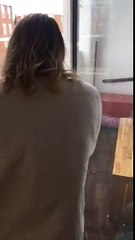 Girl hears rumours of pigeon on balcony