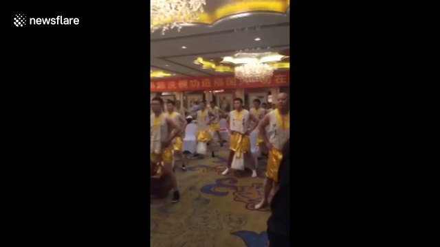 Bizarre form of kung-fu involves hanging boxes from genitals