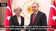 Britain's May urges Turkey to maintain rule of law, human rights