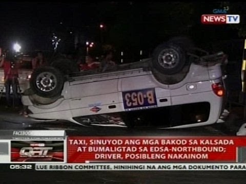 QRT: Taxi, sinuyod ang mga bakod sa kalsada at bumaligtad sa EDSA-Northbound