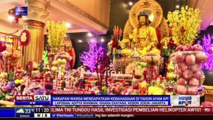 Vihara Ekayana, Bagikan Jeruk dan Angpao