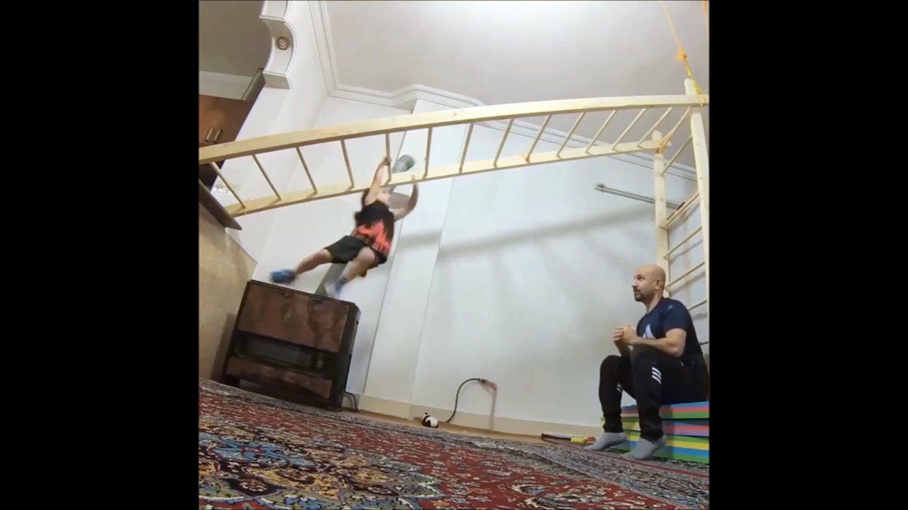 Father Supporting his Brave Daughter in strength Training