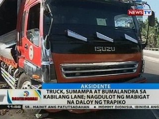 BT: Truck, sumampa at bumalandra sa kabilang lane