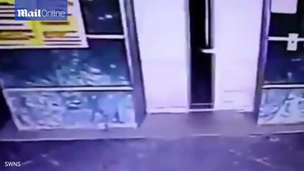 Incredible moment mother KICKS her toddler daughter to safety