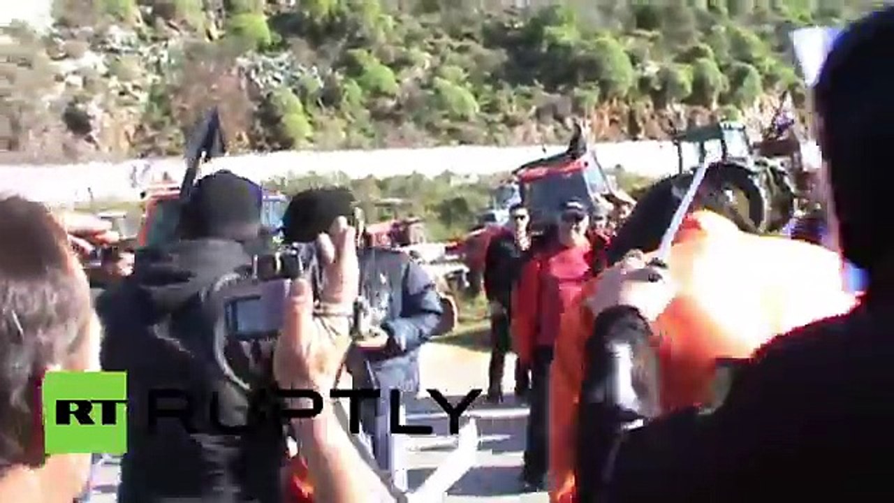 Greece_ Farmers hold mock 'ISIS' execution to protest austerity taxes