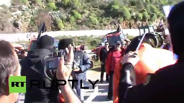 Greece_ Farmers hold mock 'ISIS' execution to protest austerity taxes