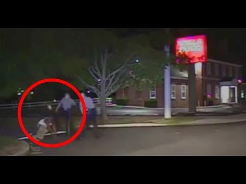 Dover Cop Kicks innocent man in the face
