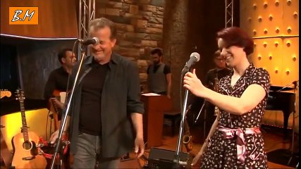 Γίνε κομμάτια -- Νίκος Πορτοκάλογλου & Ανδριάννα Μπάμπαλη