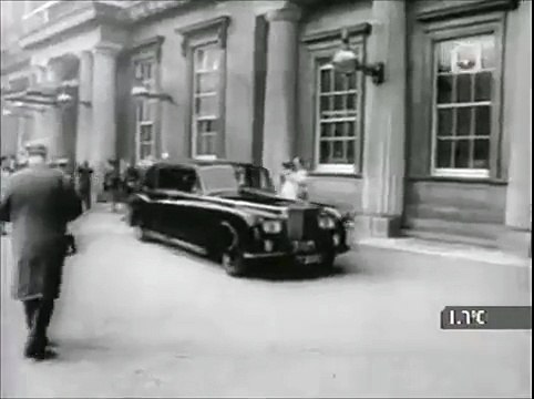 The Beatles leaving Buckingham Palace with MBE