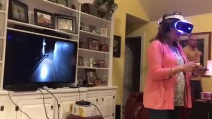 Mom completely freaks out playing VR horror game