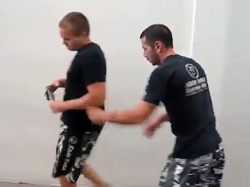 Krav Maga Gun to the head while kneeling defense !!!