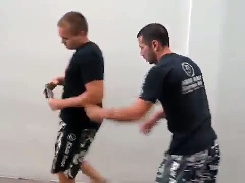 Krav Maga Gun to the head while kneeling defense !!!