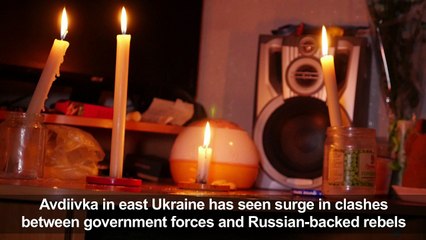 Music drowns out shelling in Ukraine flashpoint town