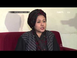 Ria Irawan berkerudung untuk menutupi kerontokannya