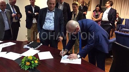 Reagimet pas marrëveshjes për rrënimin e murit