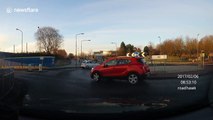 Car door swings open when motorist drives around roundabout