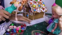 Gingerbread house DECORATING! ELSA, ANNA toddlers use candies, sprinkles, royal icing!