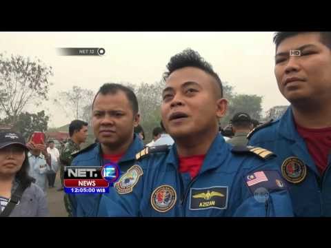 Dua Pesawat Asing Bantu Pemadaman Kebakaran Lahan dan Hutan di Sumatera Selatan - NET12