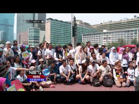 Aksi Peduli Ratusan Orang Bersihkan Sampah di Bundaran HI - NET12