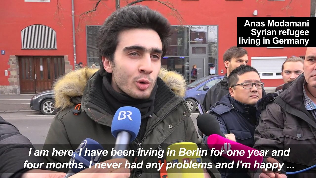 Syrian refugee, hounded over Merkel selfie, sues Facebook