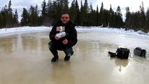 Magnificent aerial footage of 'crater pond' in Canadian wilderness